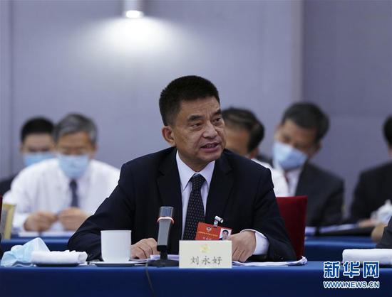 5月23日，全國政協(xié)委員劉永好在政協(xié)聯(lián)組會上發(fā)言。新華社記者 謝環(huán)馳 攝