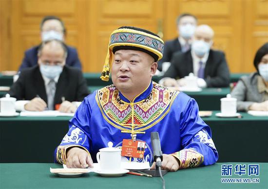  5月24日，全國人大代表宋慶禮參加湖北代表團(tuán)的審議并發(fā)言。新華社記者 黃敬文 攝